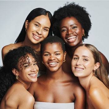 Five people smiling together