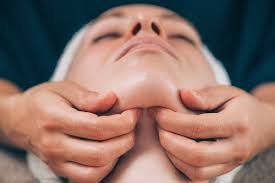 Close view of a face and neck massage